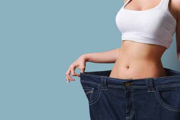 woman after fat reduction treatment Bournemouth