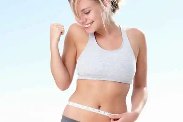 woman happy after fat reduction treatment Bournemouth