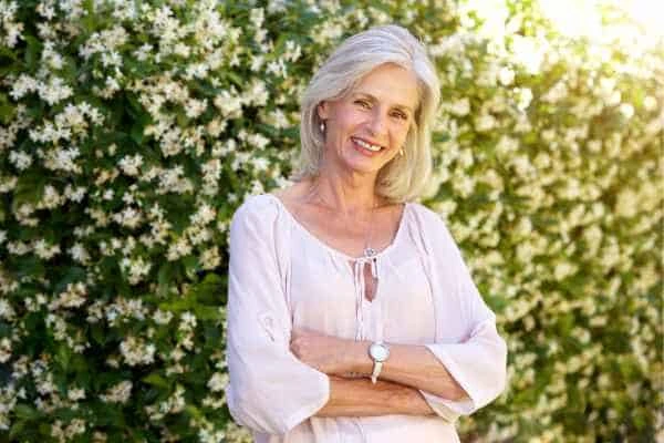 Older woman happy with urinary incontinence treatment Bournemouth