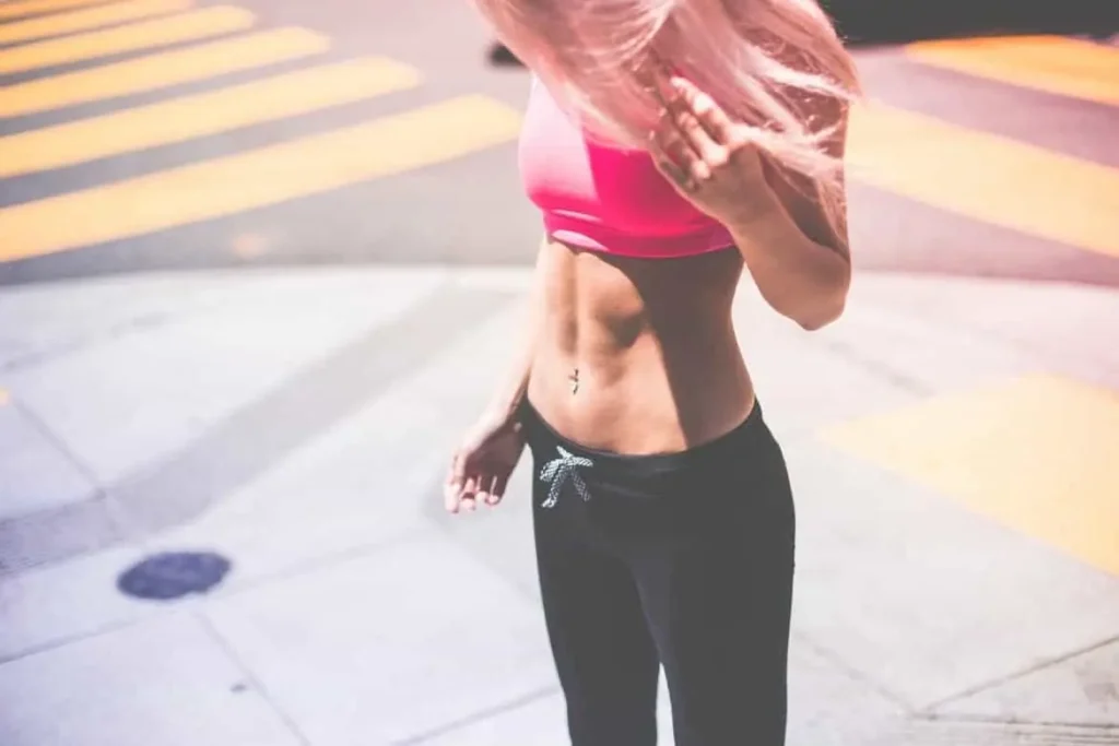 Woman with toned stomach after LA-EMS Body Sculpting Treatment Bournemouth